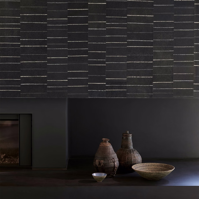 Dark indigo wallpaper with pale broken lines forming irregular vertical panels