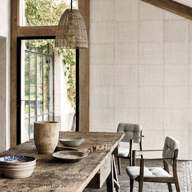 Chalk-white textured wallpaper with a fine woven grid in a dining room