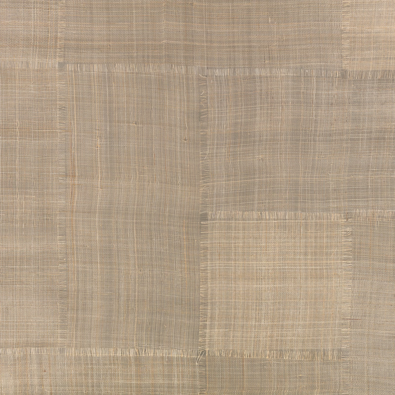 Warm sepia-taupe patchwork panels with a fine crosshatched, textile-like surface