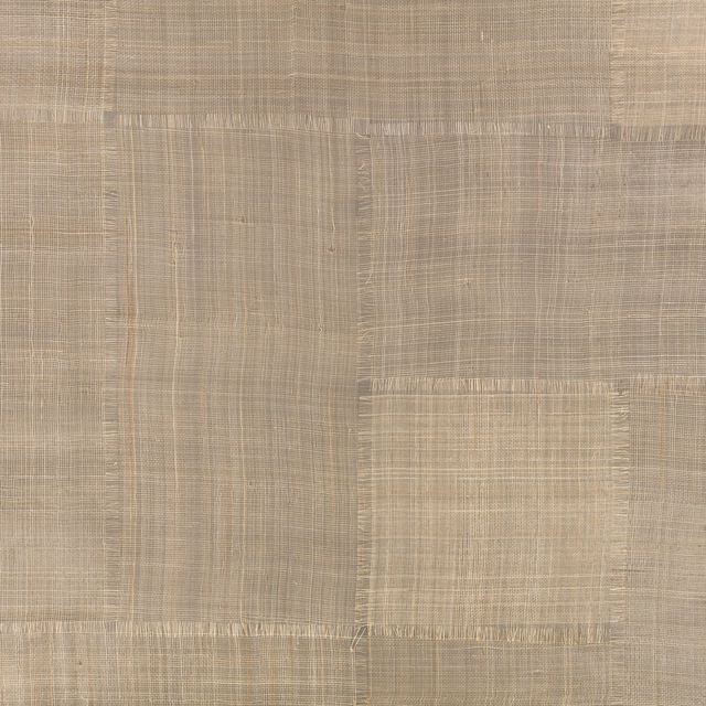 Warm sepia-taupe patchwork panels with a fine crosshatched, textile-like surface