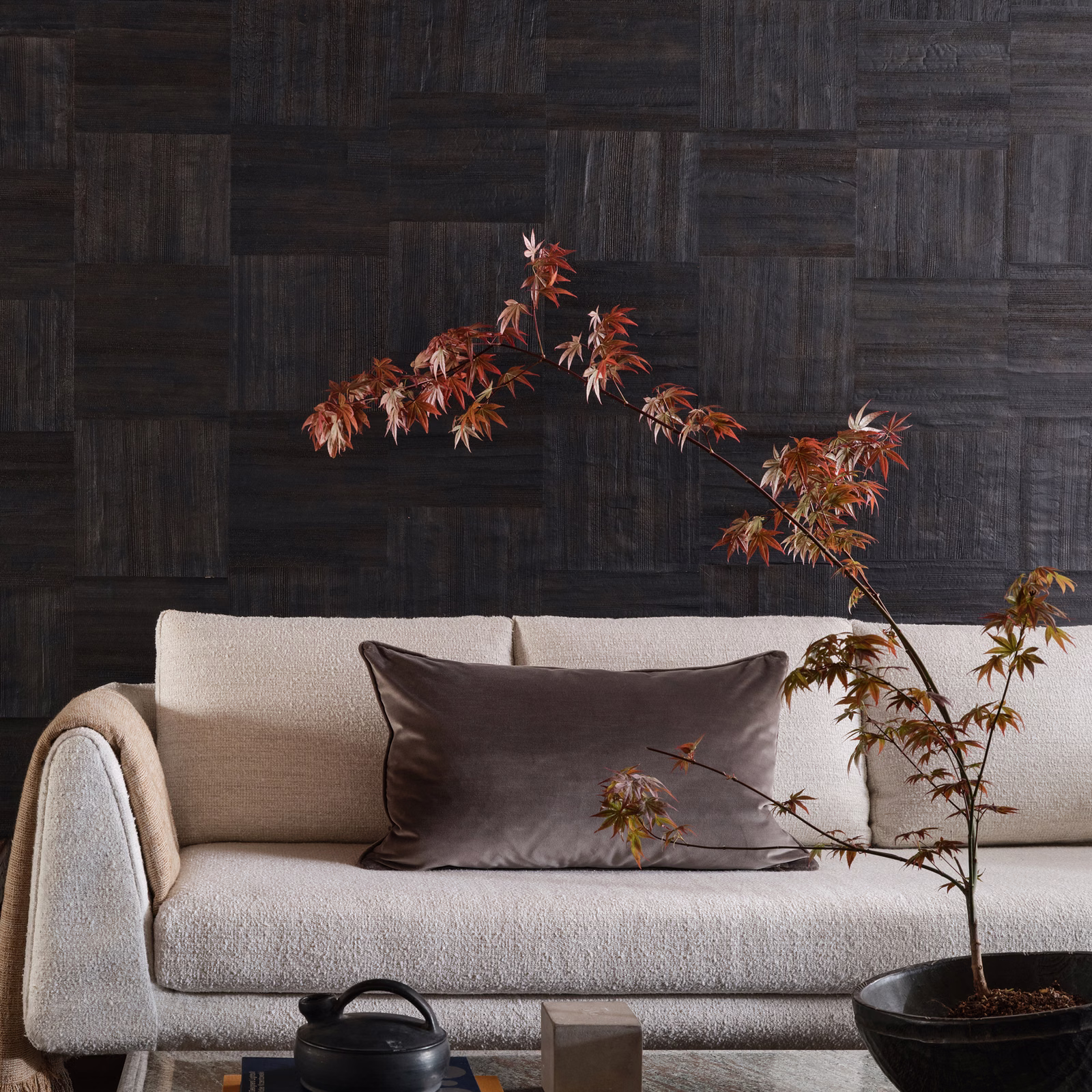 Deep indigo wallpaper with charcoal timber-like panels and tonal brushed grain