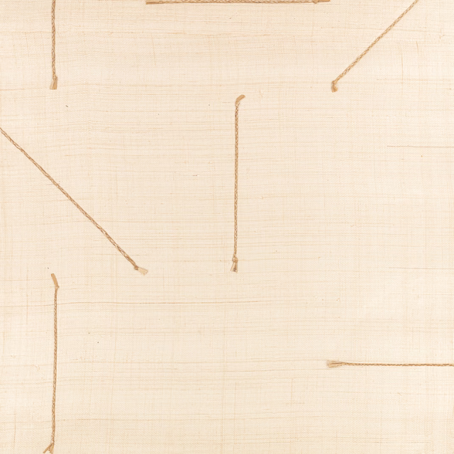 Warm cream wallpaper with fine grid texture and sparse irregular tan lines