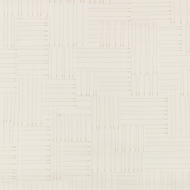 Warm ivory wallpaper with delicate grey lines forming offset rectangular geometric blocks