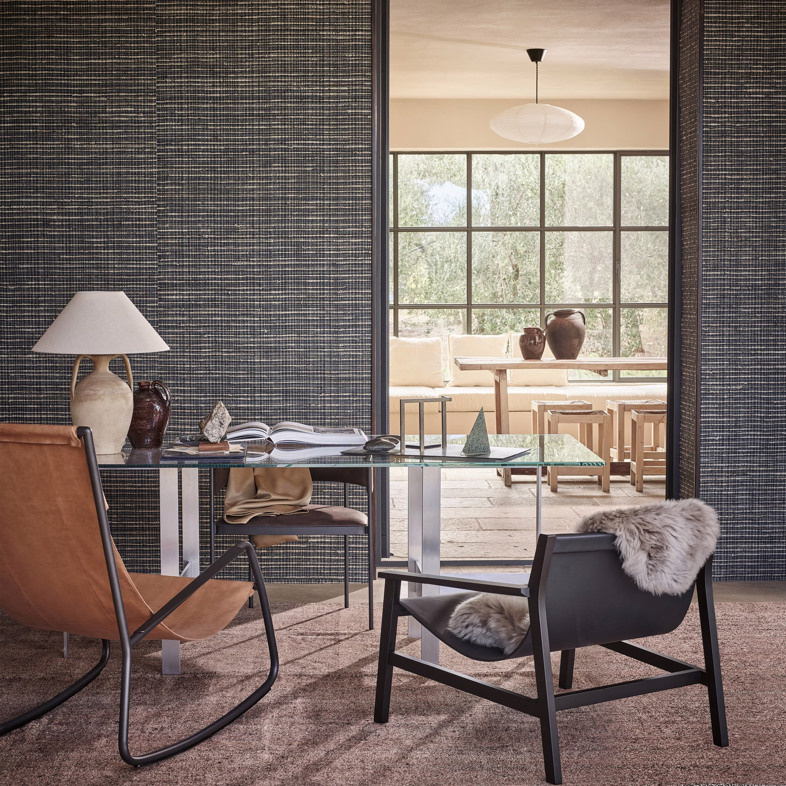 Deep indigo wallpaper with fine charcoal crosshatch lines and woven-look texture