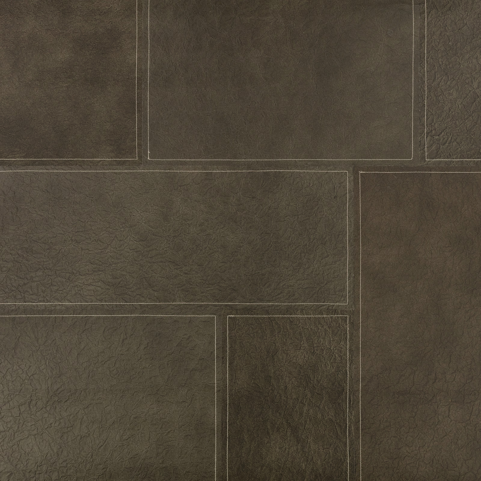 Deep olive-brown wallcovering with outlined rectangles and a softly crinkled surface