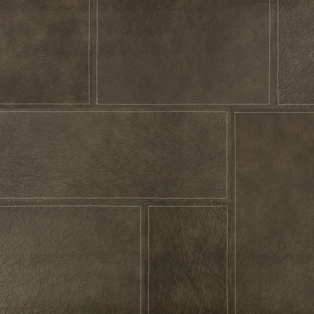 Deep olive-brown wallcovering with outlined rectangles and a softly crinkled surface