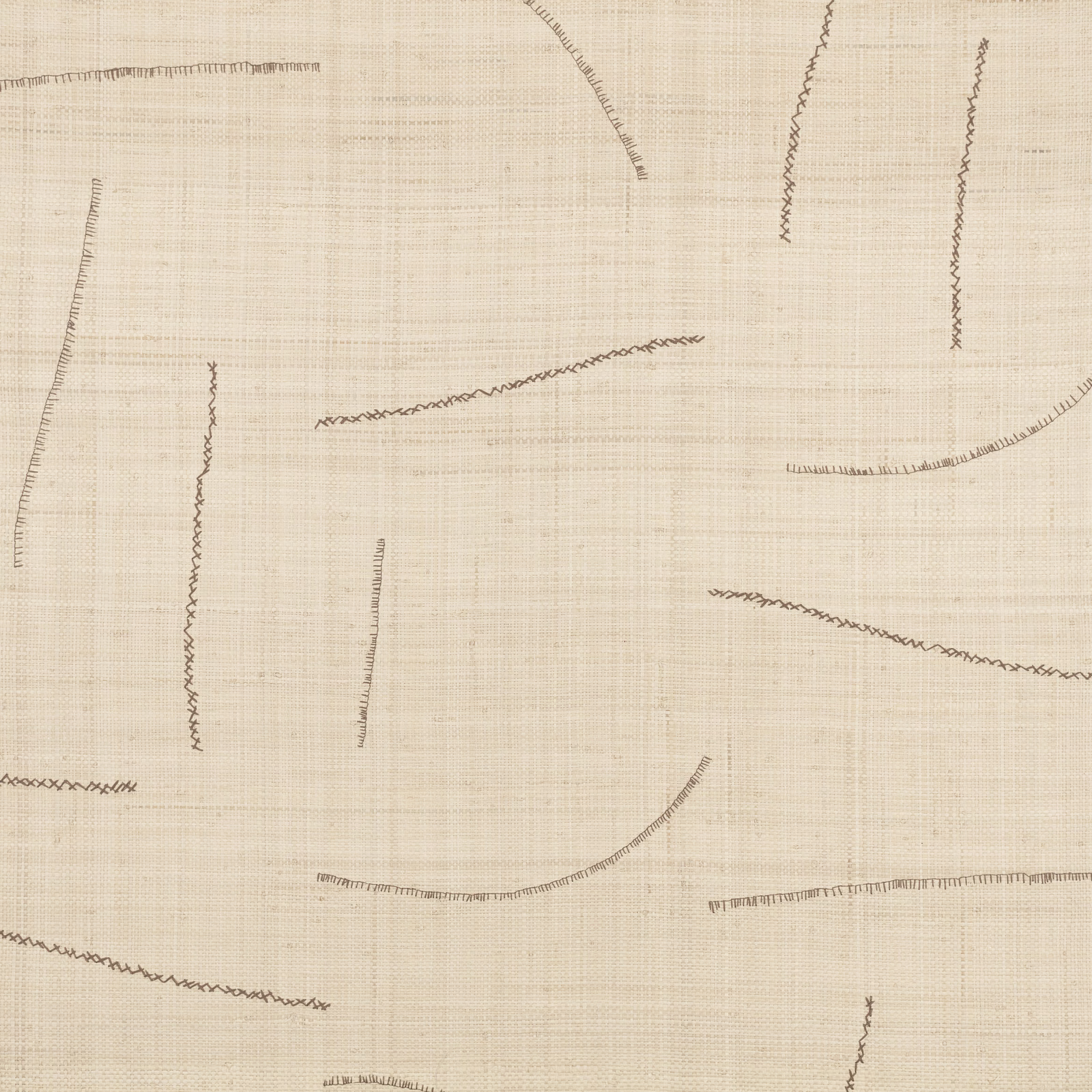 Warm ivory wallpaper with fine woven texture and scattered taupe broken-line marks