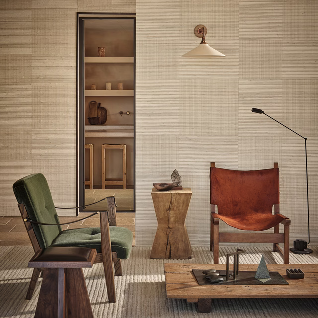 Warm ivory wallpaper with fine horizontal woven lines in a calm interior