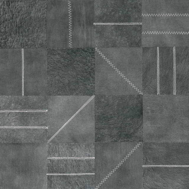 Cool grey-green wallpaper swatch with mottled panels and contrasting zigzag stitch lines