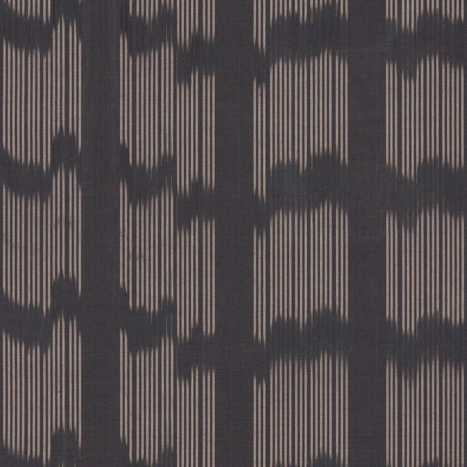 Charcoal and taupe woven swatch with fine vertical lines and dark irregular bands