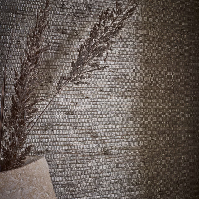Deep parchment taupe grasscloth wallpaper with irregular horizontal ridges and a subtle sheen