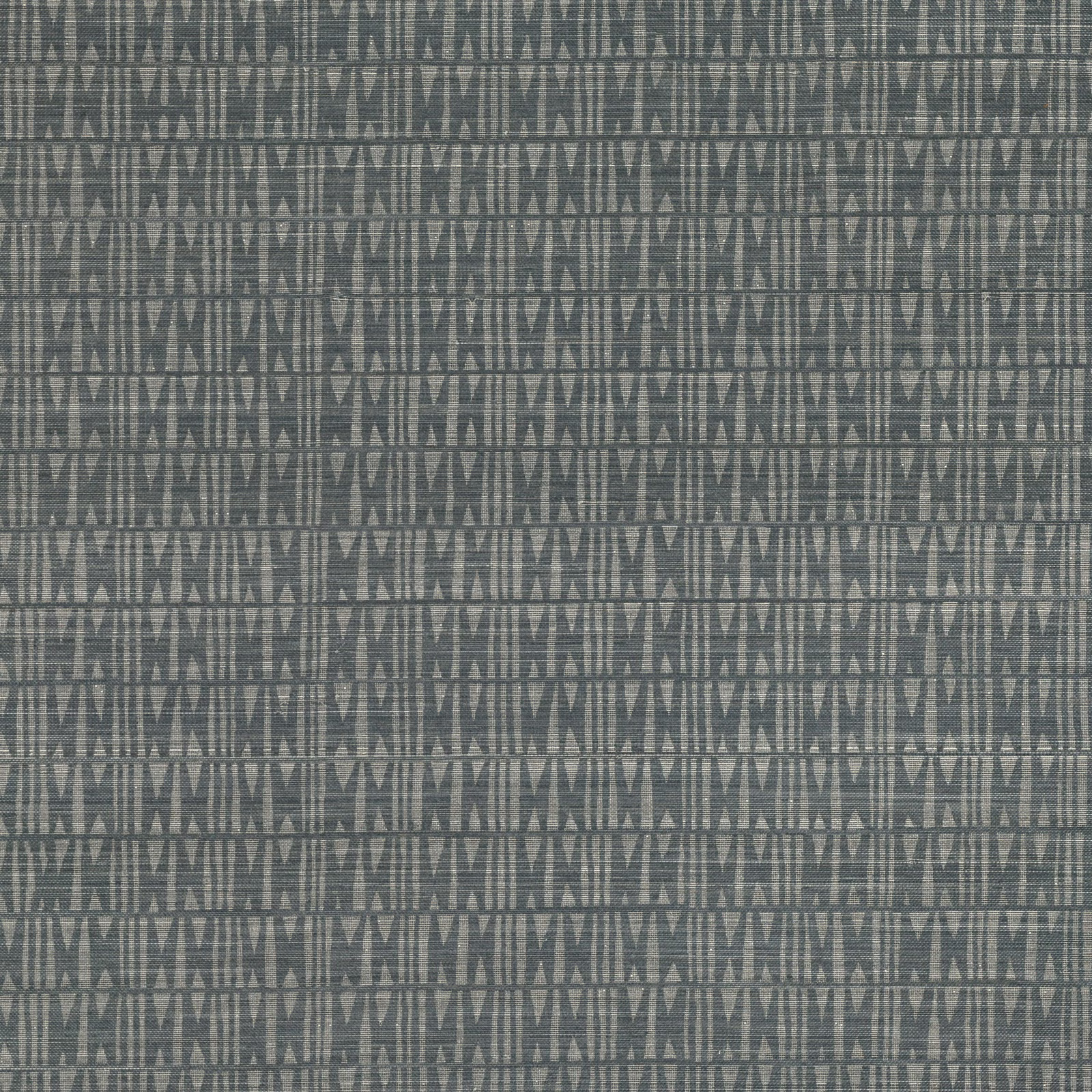 Deep indigo-grey wallpaper with repeated vertical geometric motifs and horizontal grasscloth texture