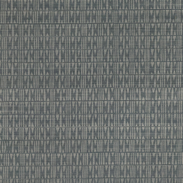 Deep indigo-grey wallpaper with repeated vertical geometric motifs and horizontal grasscloth texture