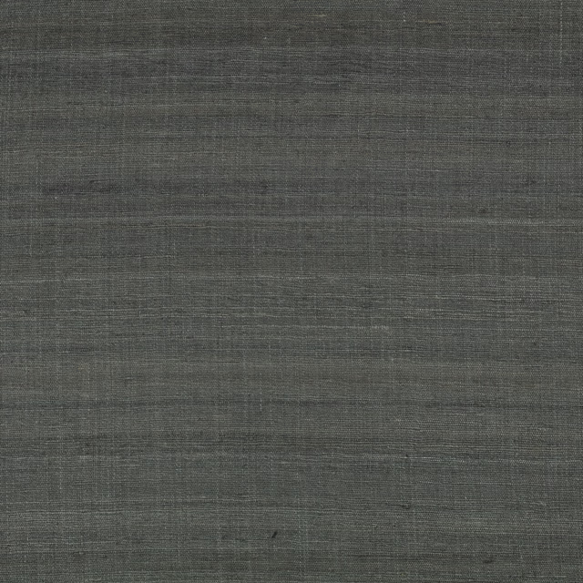 Muted indigo-grey fabric with fine horizontal slubs and charcoal tonal variation
