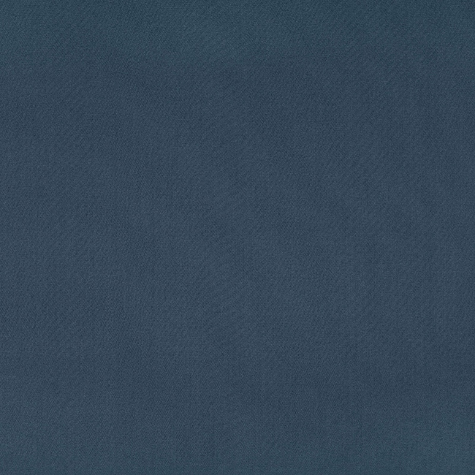 Deep indigo blue fabric with a fine, subtly tonal plain weave