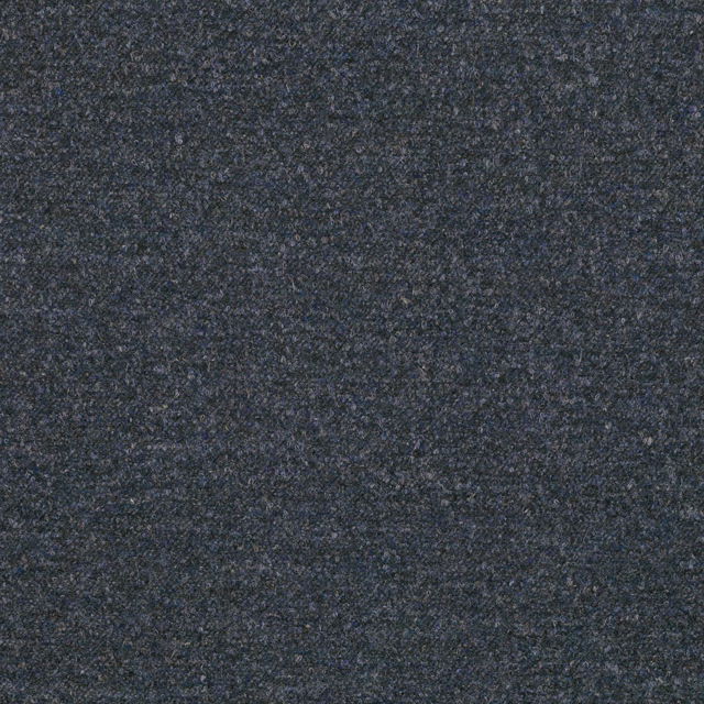 Dark indigo woven swatch with a fine, mottled nubby texture