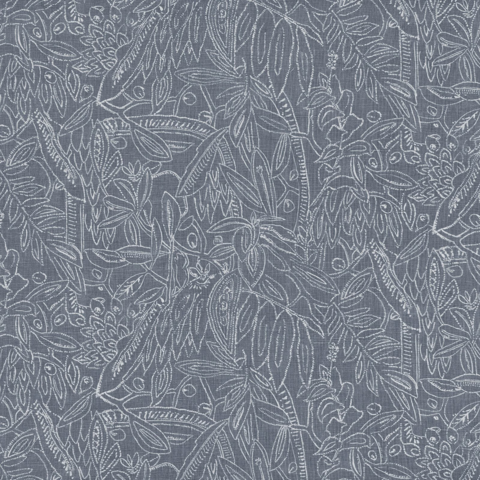 Cool indigo-blue fabric with dense pale botanical leaves, tendrils and flowers
