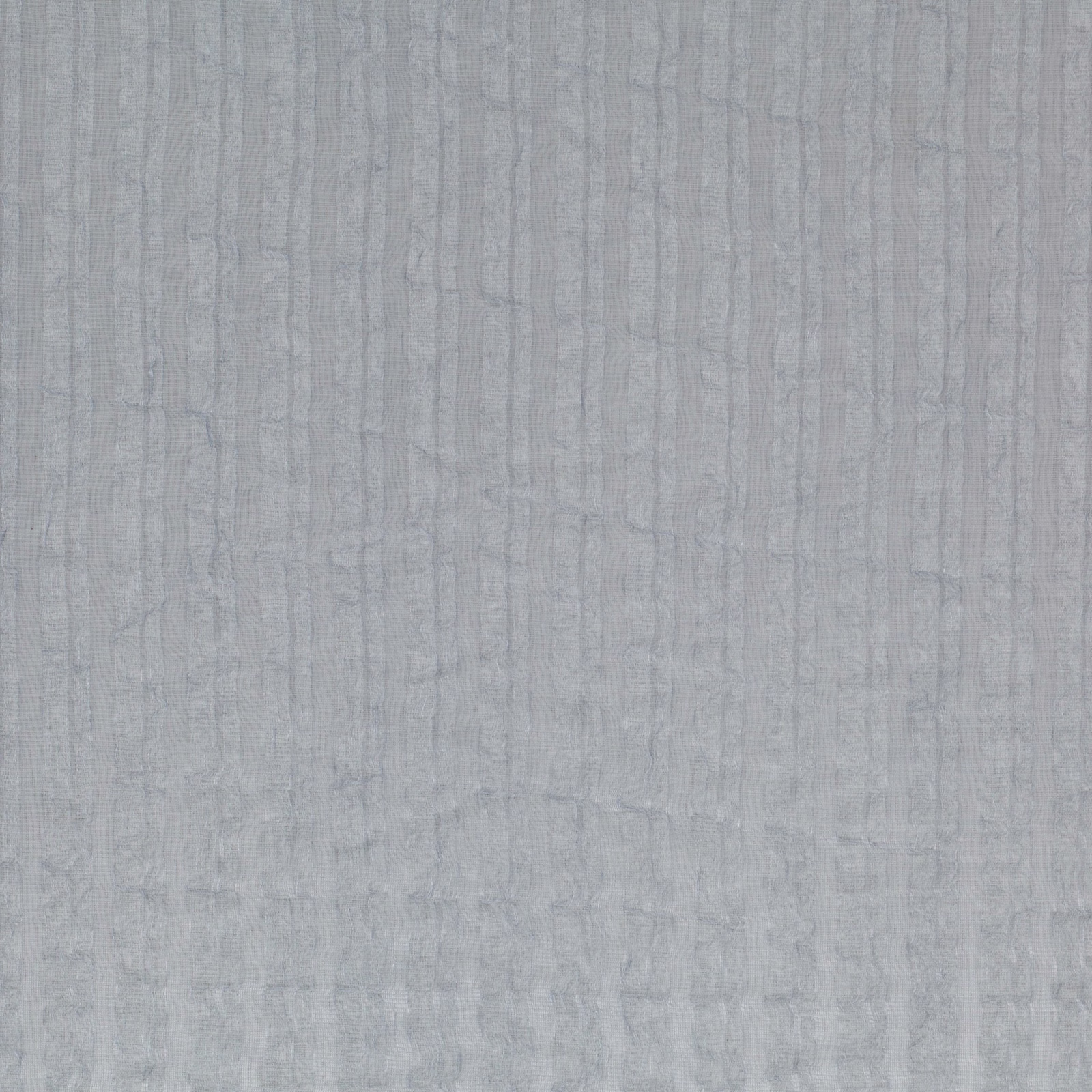 Pale blue-grey textile with fine vertical striations and softly mottled texture