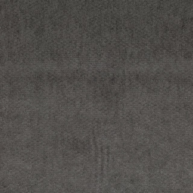 Close-up of deep charcoal fabric with fine mottled chevron-like woven texture