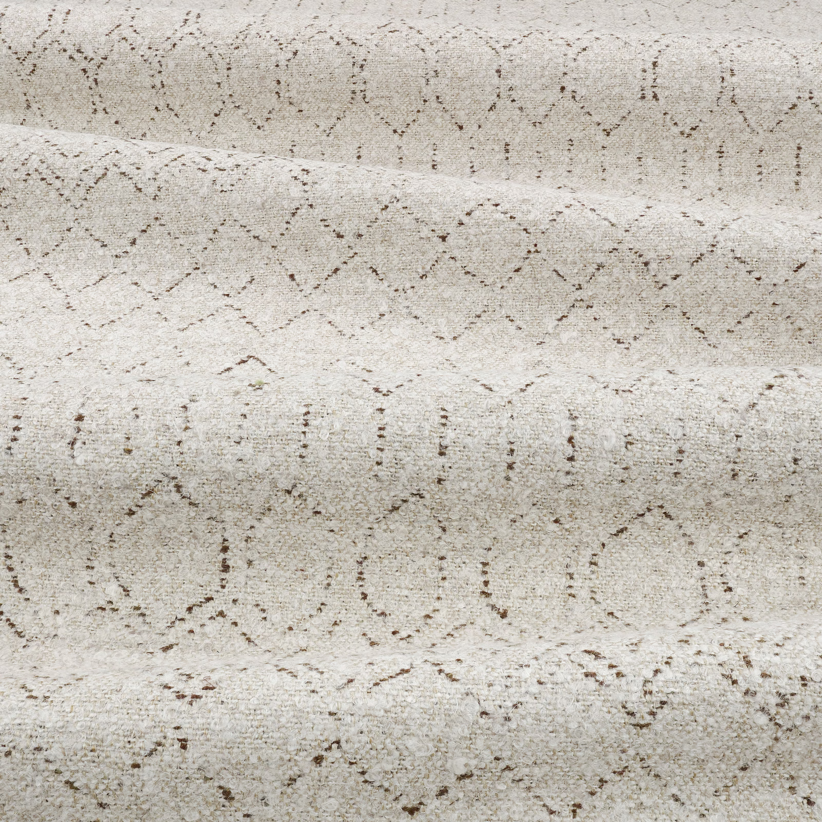 Pale parchment beige woven fabric with broken taupe diamonds and dotted lines