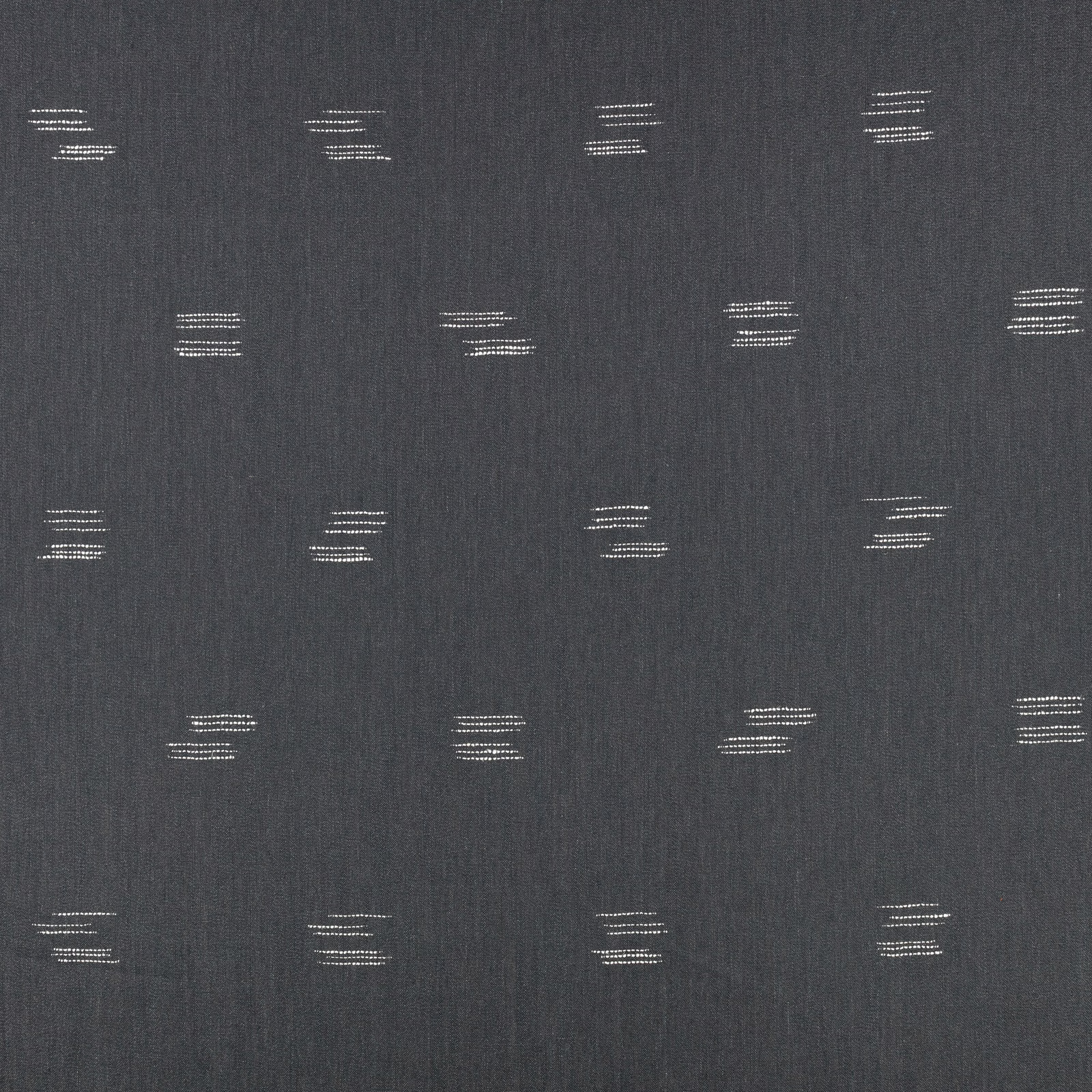 Deep indigo woven fabric with small pale horizontal motifs in a staggered grid