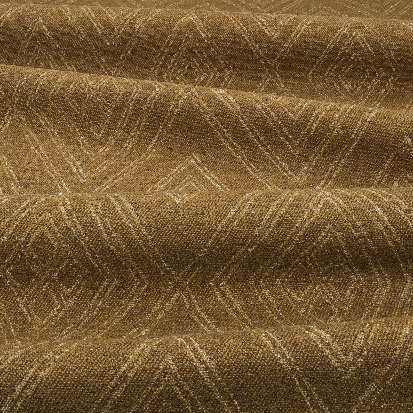 Bronze-brown woven fabric with muted gold chevron lines and tactile pebbled texture