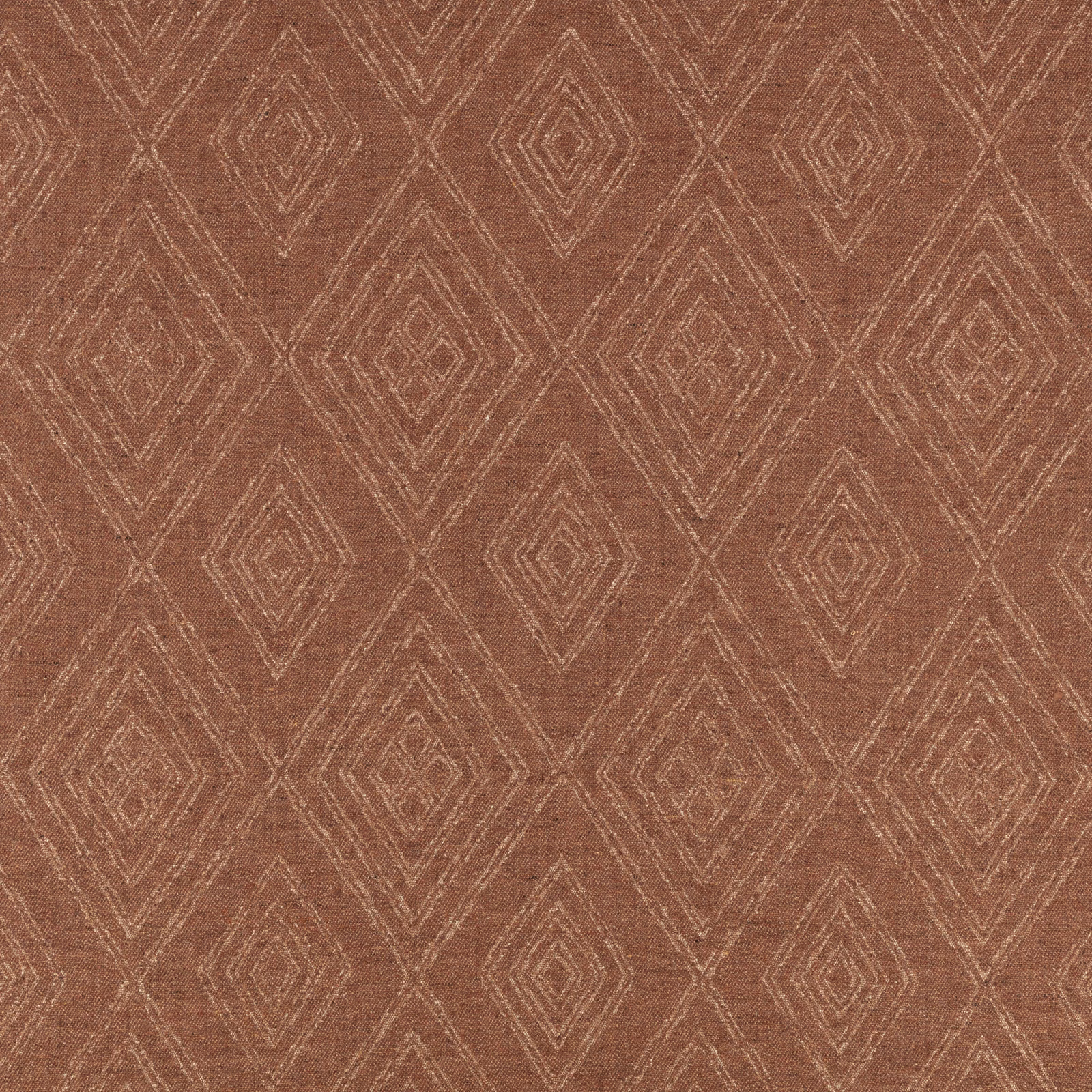Warm sienna fabric with pale nested diamond motifs and a softly textured woven surface