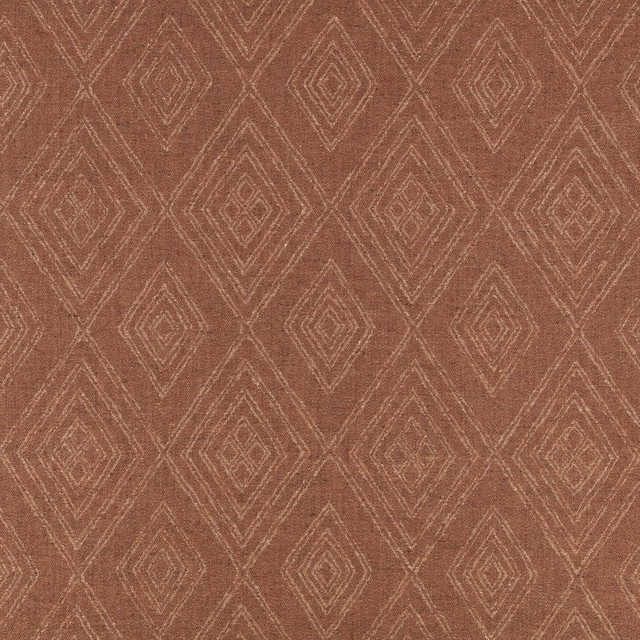 Warm sienna fabric with pale nested diamond motifs and a softly textured woven surface