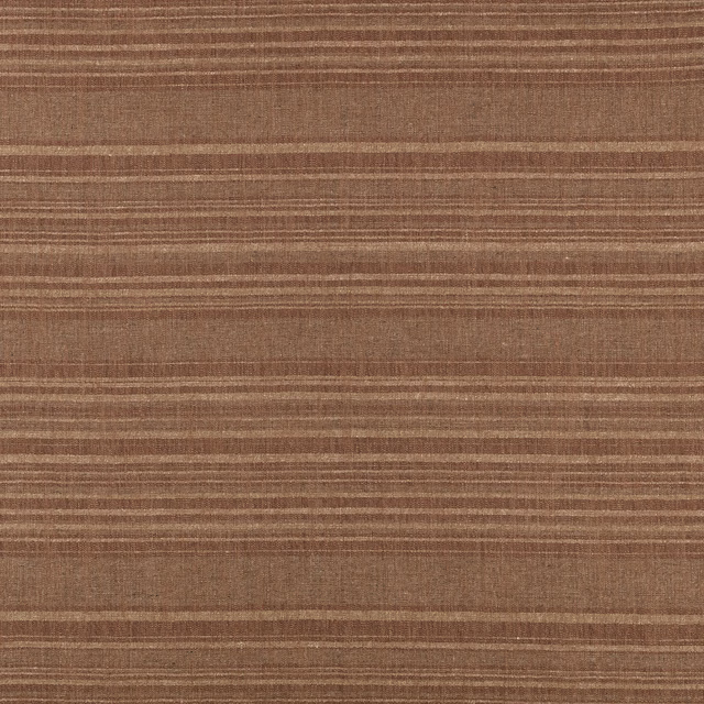 Warm clay-brown woven fabric with irregular horizontal bands and fine texture