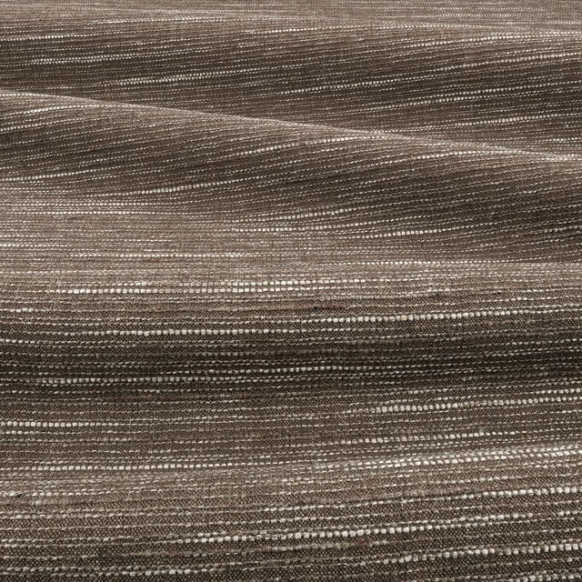 Close view of warm chestnut-brown woven fabric with irregular horizontal taupe striations