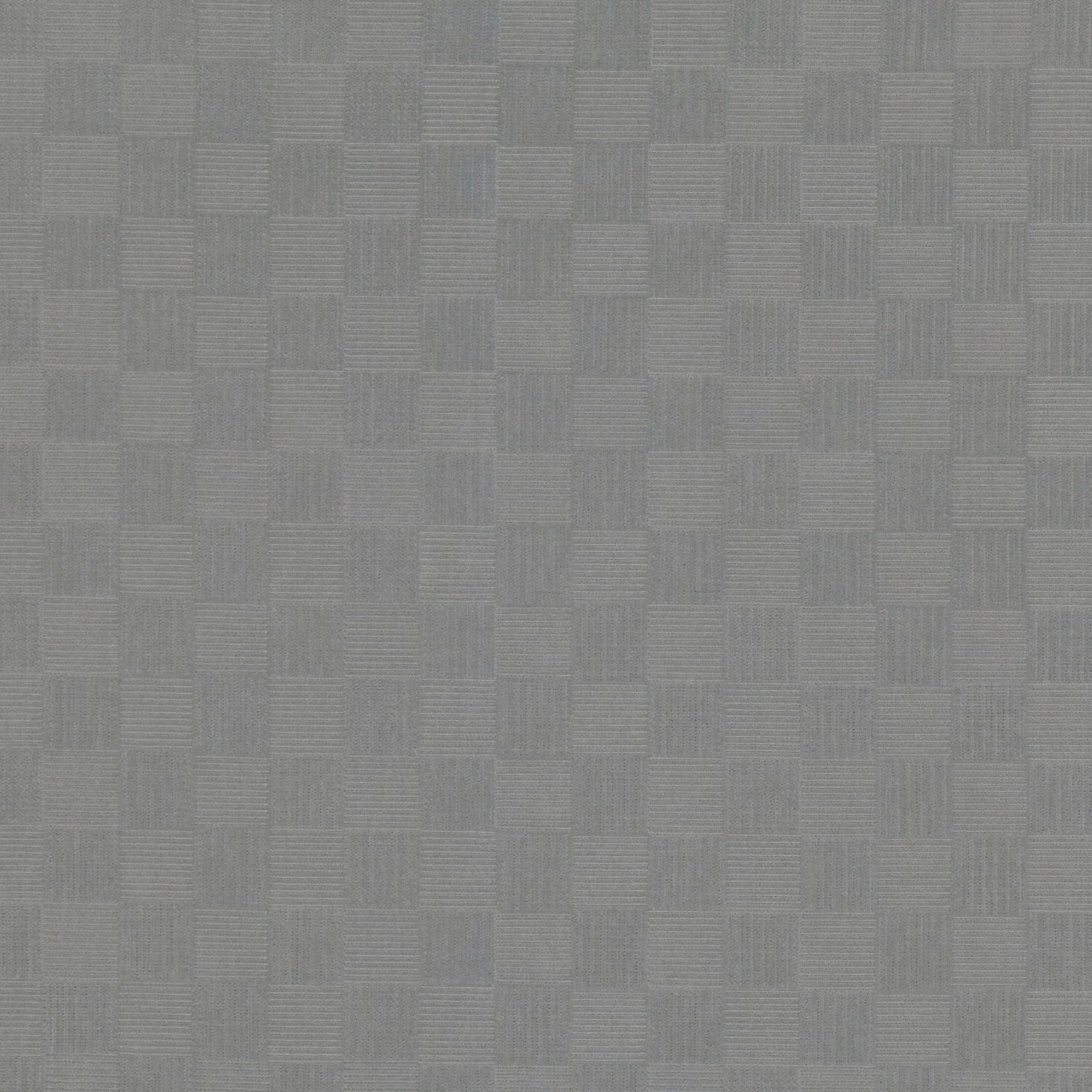 Close-up of cool storm-grey woven fabric with tonal rectangular blocks and fine lines