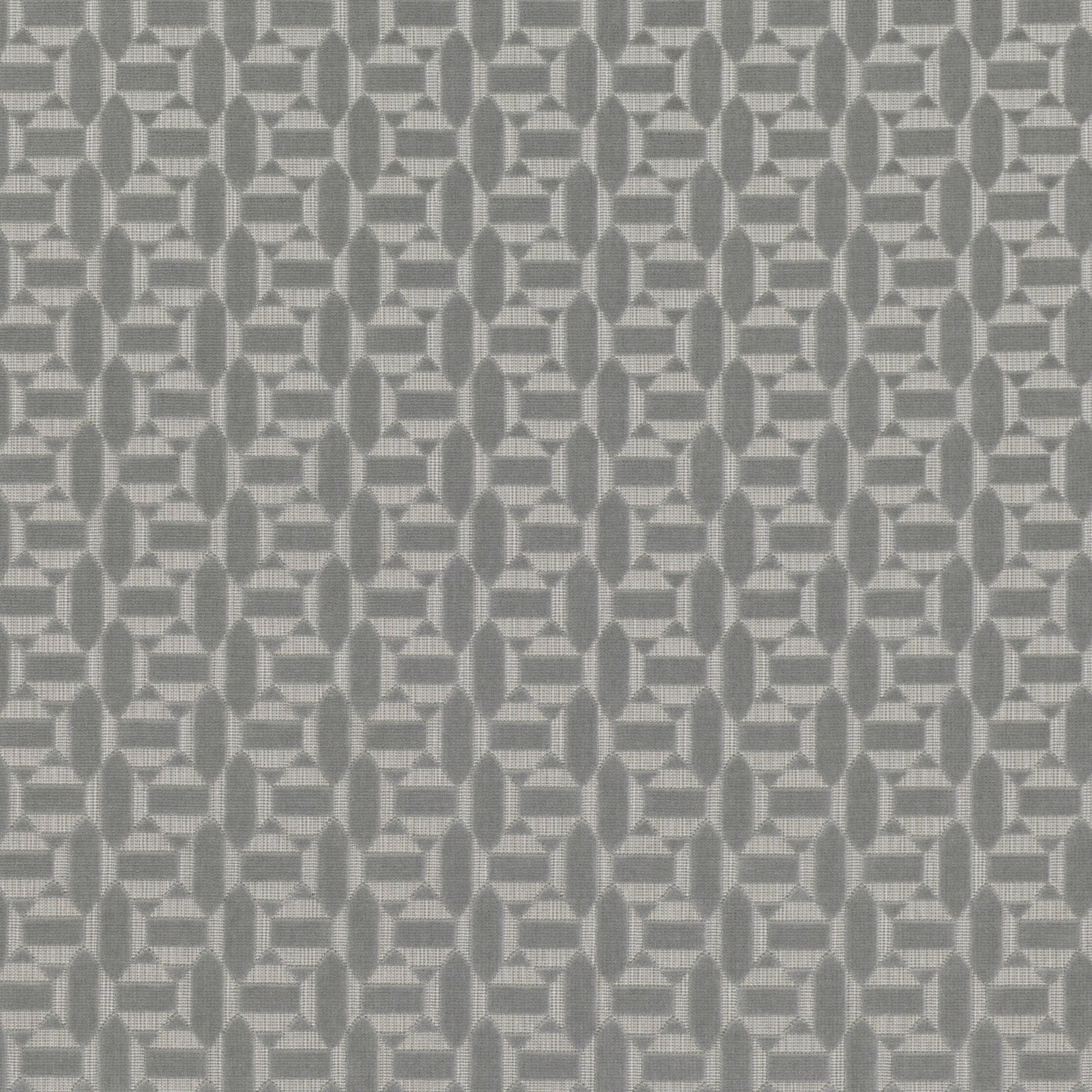 Cool grey woven fabric with repeating stepped and elongated oval geometric motifs
