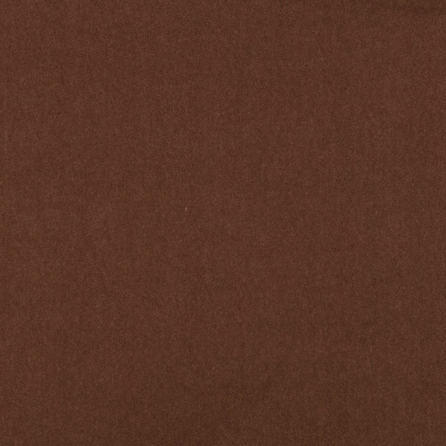 Warm carnelian-brown plush textile with a softly mottled, light-catching surface