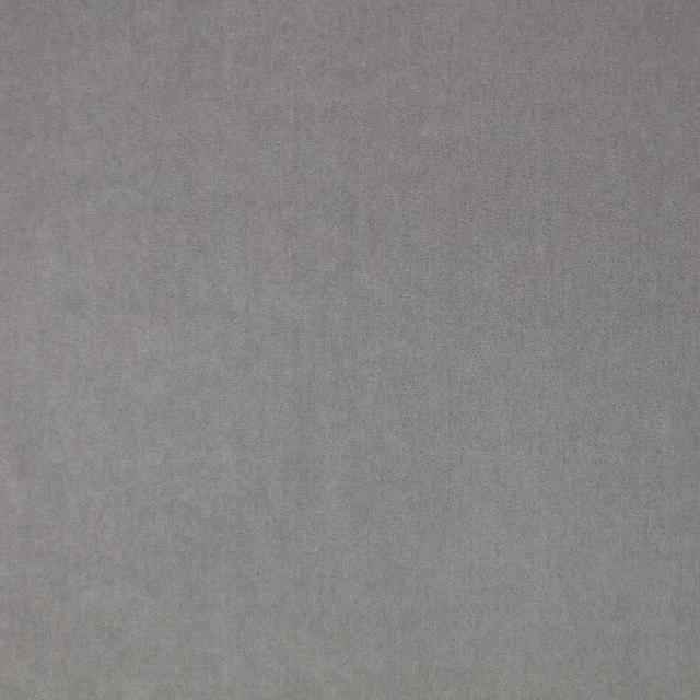 Close-up of soft lead-grey plush fabric with subtle nap and tonal shading