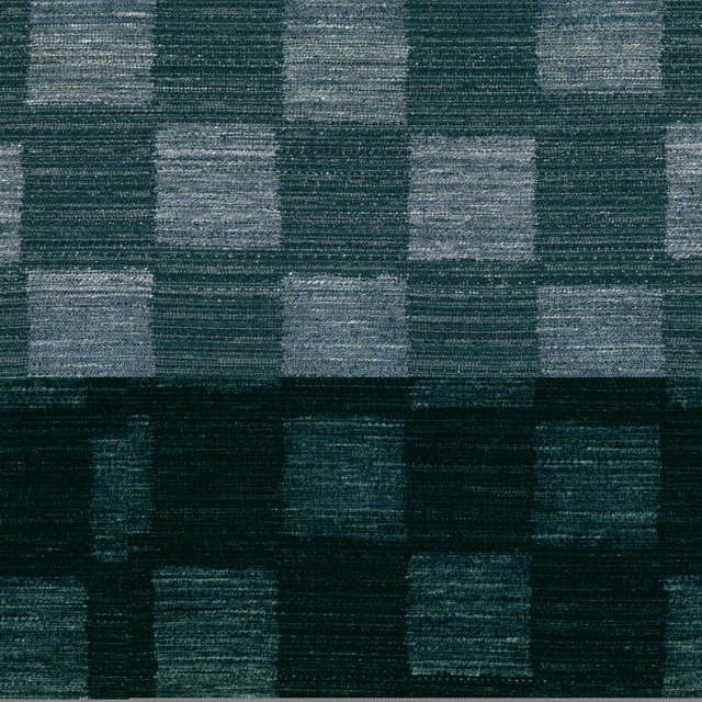 Deep teal woven fabric with staggered blue-grey rectangular blocks and horizontal texture
