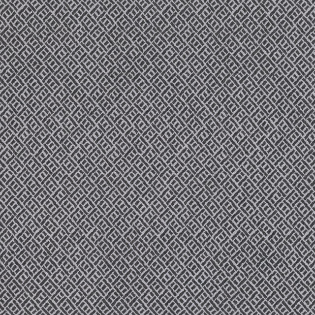 Blue-grey indigo fabric with a small pale interlocking diamond lattice weave