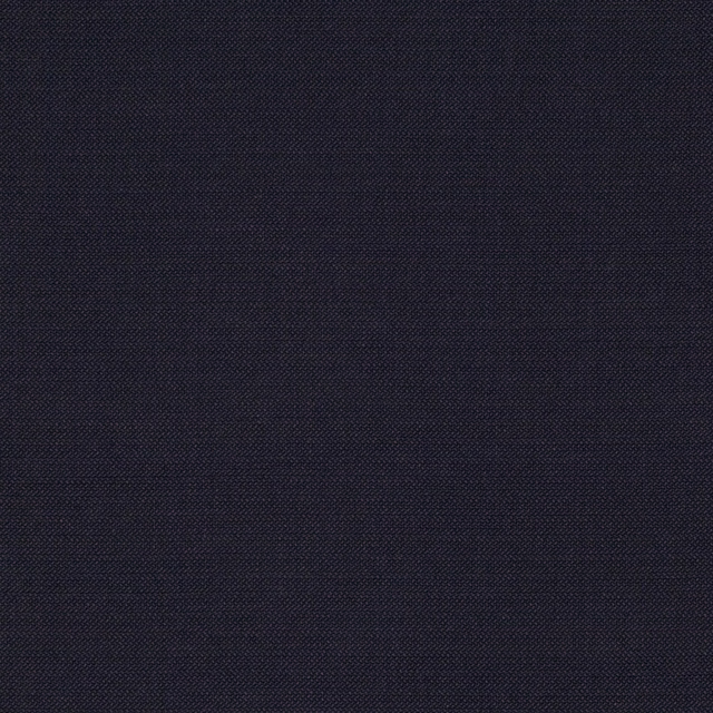 Close view of dark indigo fabric with a fine tonal crosshatch weave