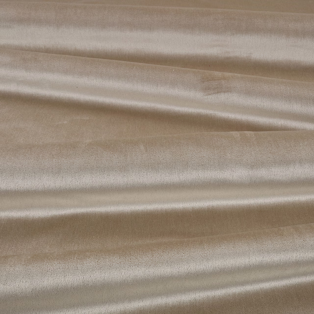 Warm taupe-beige fabric with soft sheen, fine grain and horizontal draped folds