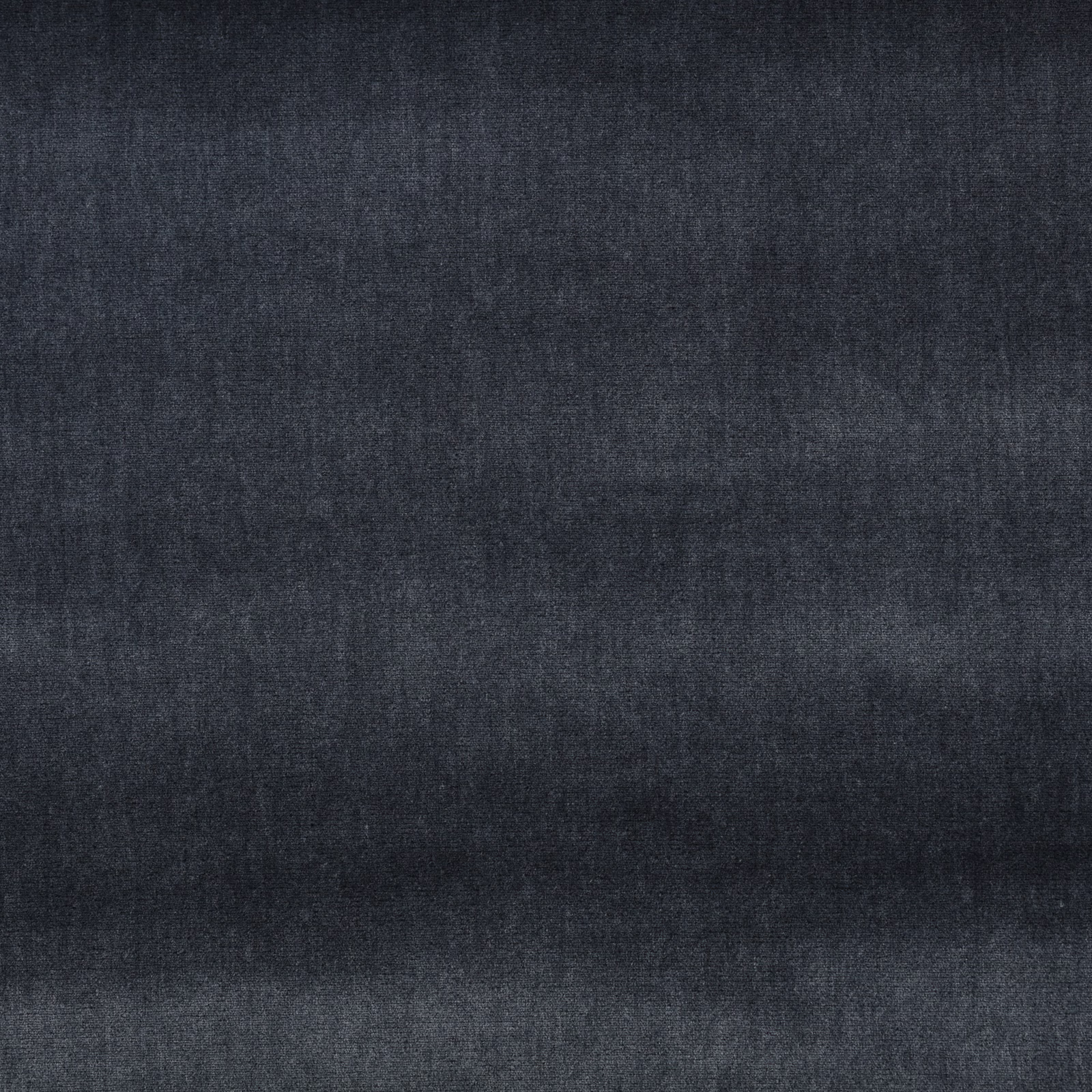 Deep ink-blue charcoal textile with soft cloudy striations and a fine woven texture