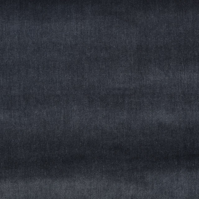 Deep ink-blue charcoal textile with soft cloudy striations and a fine woven texture