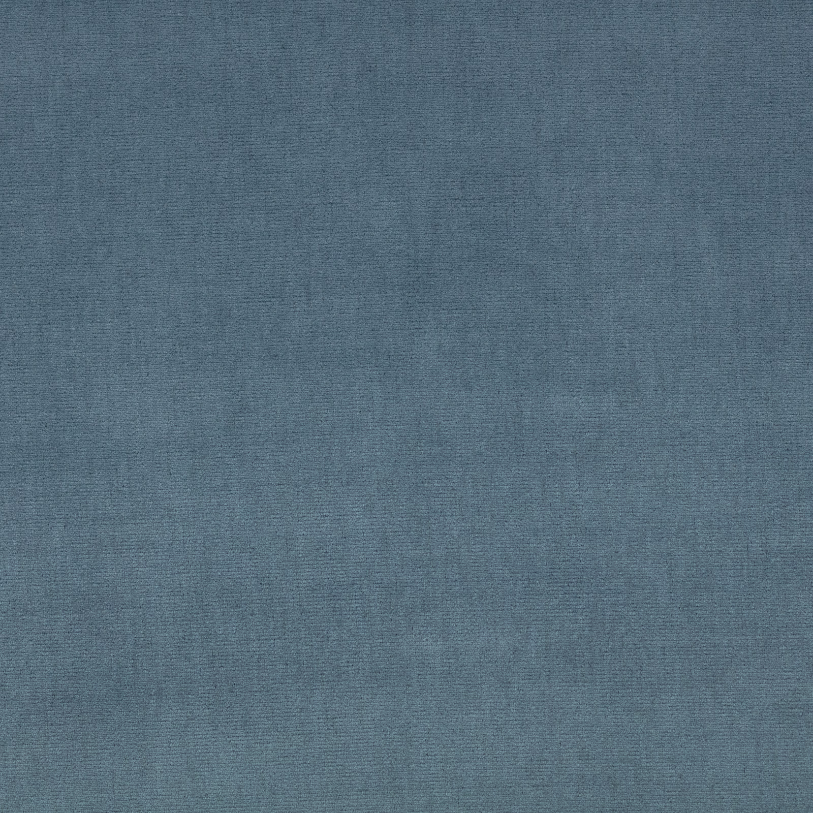 Muted blue-grey textile with fine horizontal grain and gently mottled tonal depth