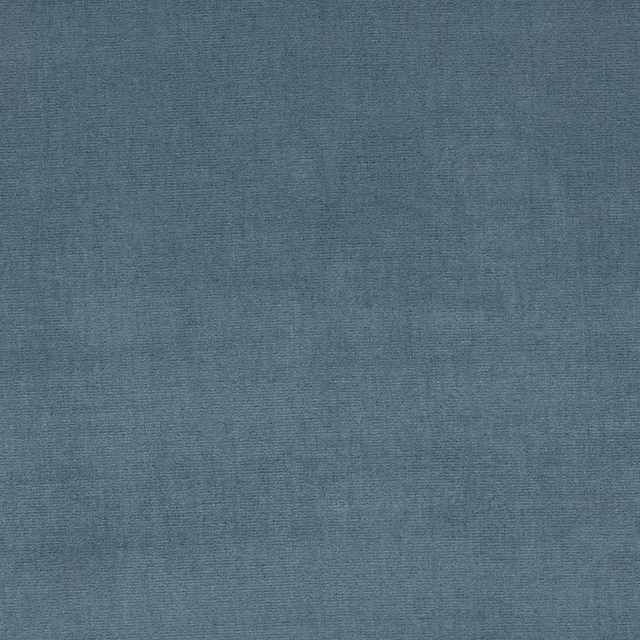 Muted blue-grey textile with fine horizontal grain and gently mottled tonal depth