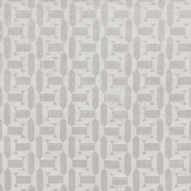 Pale blue-grey woven textile with repeating interlocking geometric blocks and vertical forms