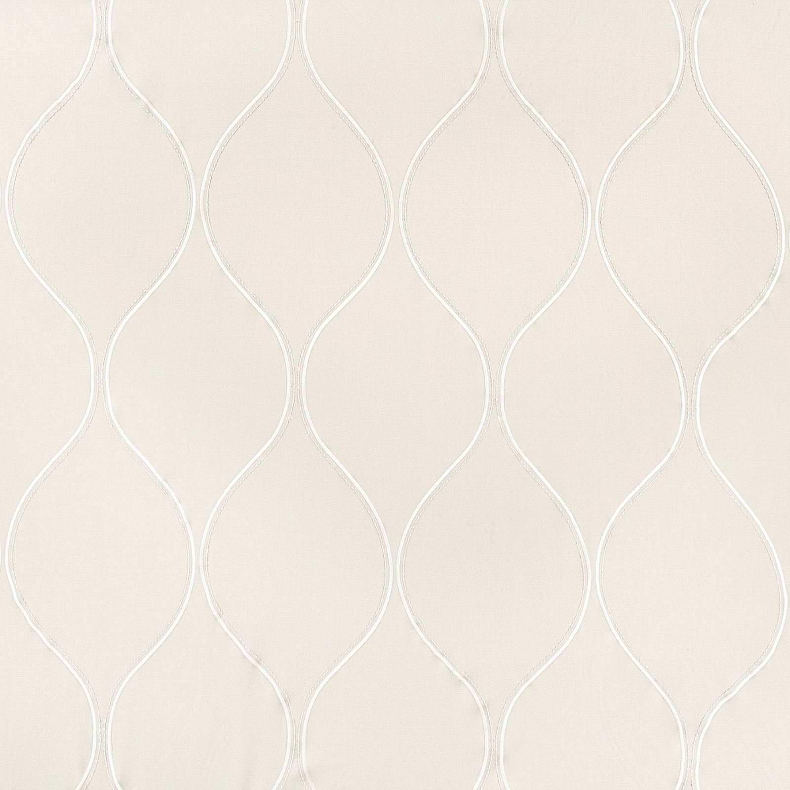 Pale Cameo Beech fabric with white looping embroidery on a warm beige ground