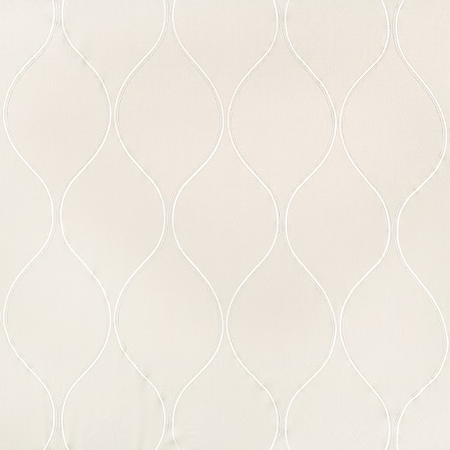 Pale Cameo Beech fabric with white looping embroidery on a warm beige ground