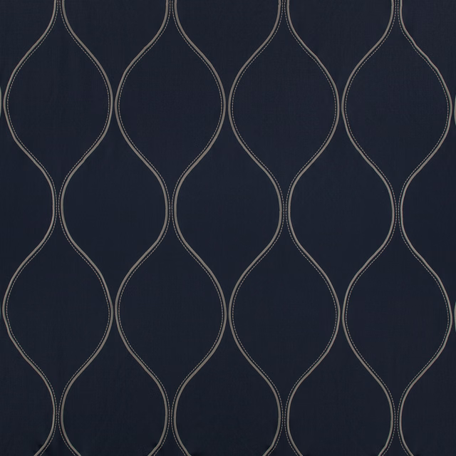 Deep blueberry navy fabric with repeating taupe loop embroidery and subtle vertical weave