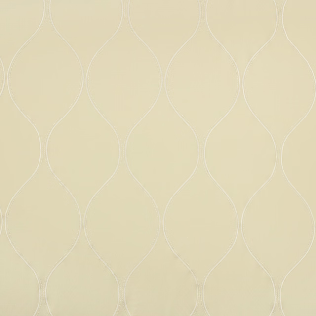 Pale cream textile with delicate white looping ogee embroidery in repeating columns