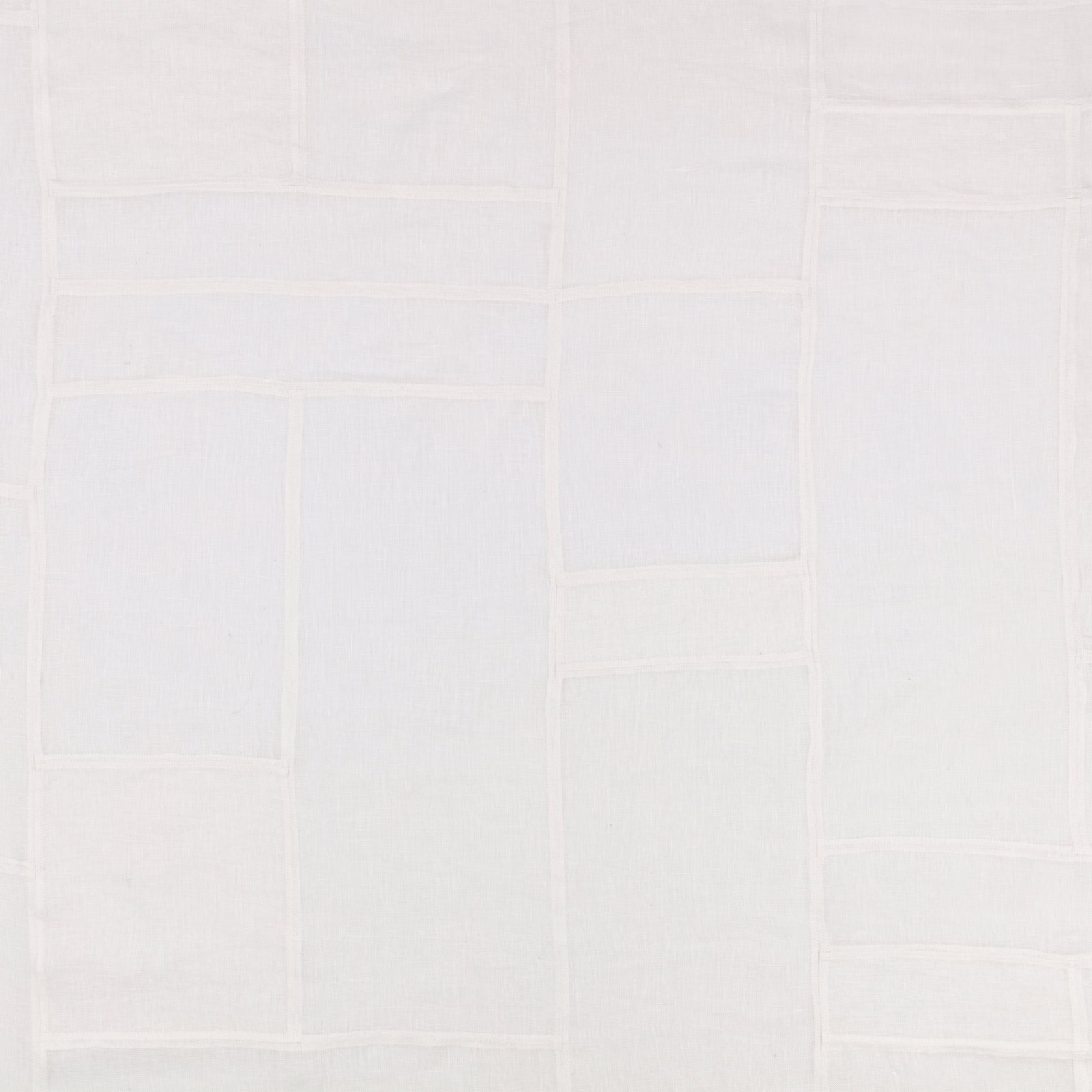 Pale ivory-white embroidered textile with softly raised rectangular panel lines