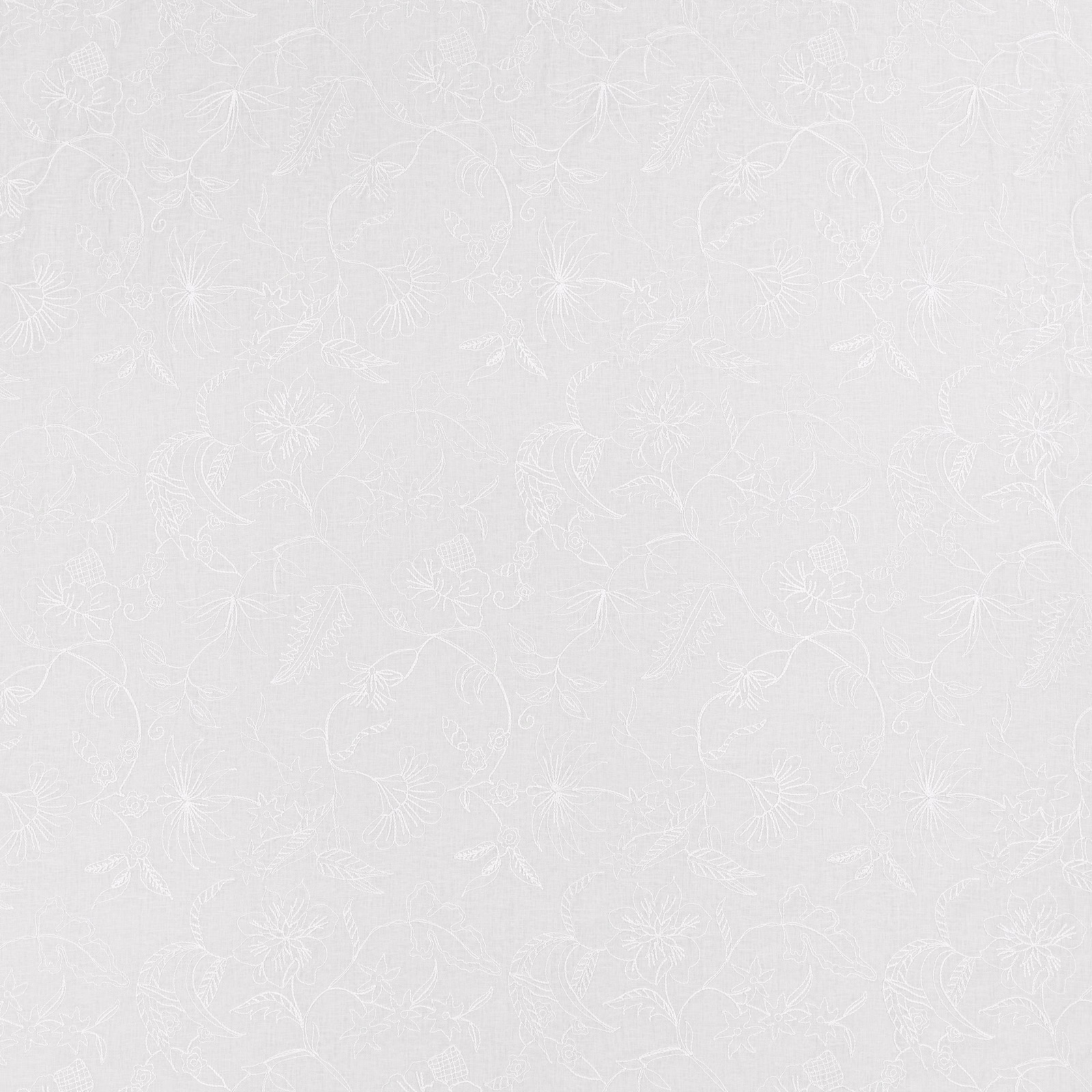 White-on-white fabric with delicate embroidered flowers, curling stems and a fine textured ground