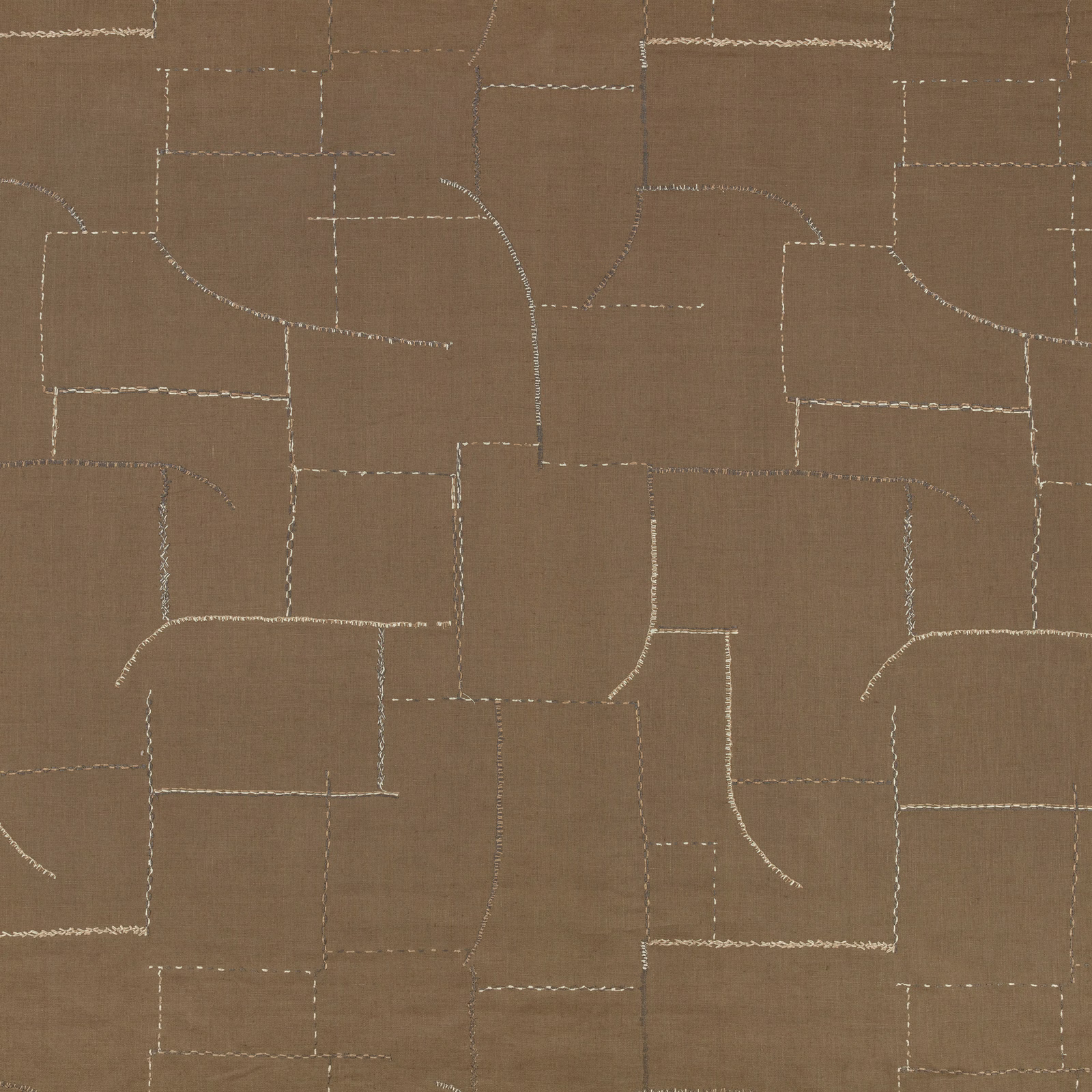 Warm cumin-brown textile with pale stitched geometric blocks and curved linework